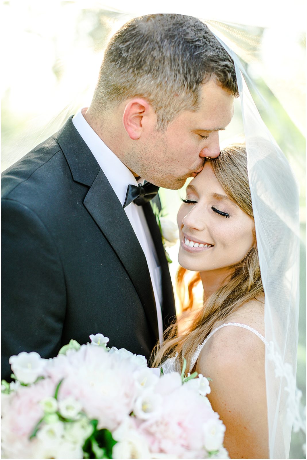 Jamie & Spencer - Summer Wedding at the Historic Longview Mansion - Kansas City Wedding Venues - Mariam Saifan Photography under a veil