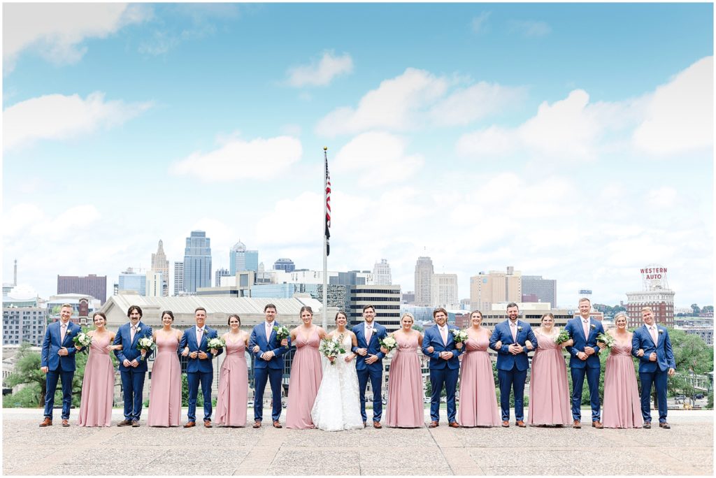 navy and pink bridal party wedding photos at the Kansas City Liberty Memorial - Wedding at Oliver Building