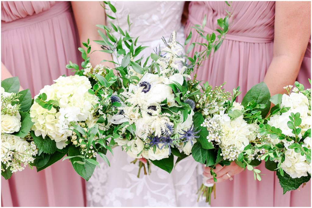 navy and pink bridal party wedding photos at the Kansas City Liberty Memorial - Wedding at Oliver Building