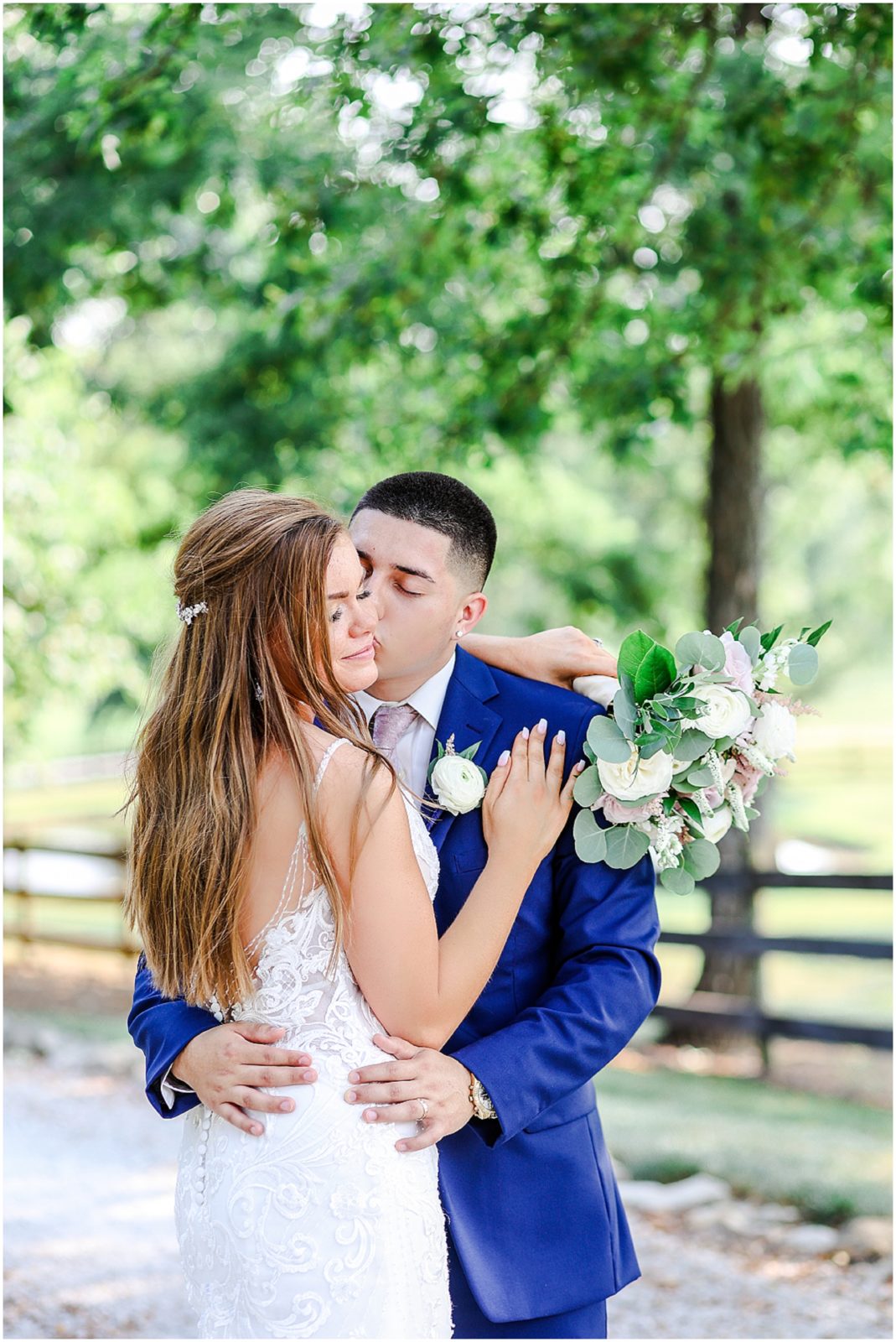 bride sitting on a swing - beautiful wedding photos - barn at river bend - kansas city wedding photographer