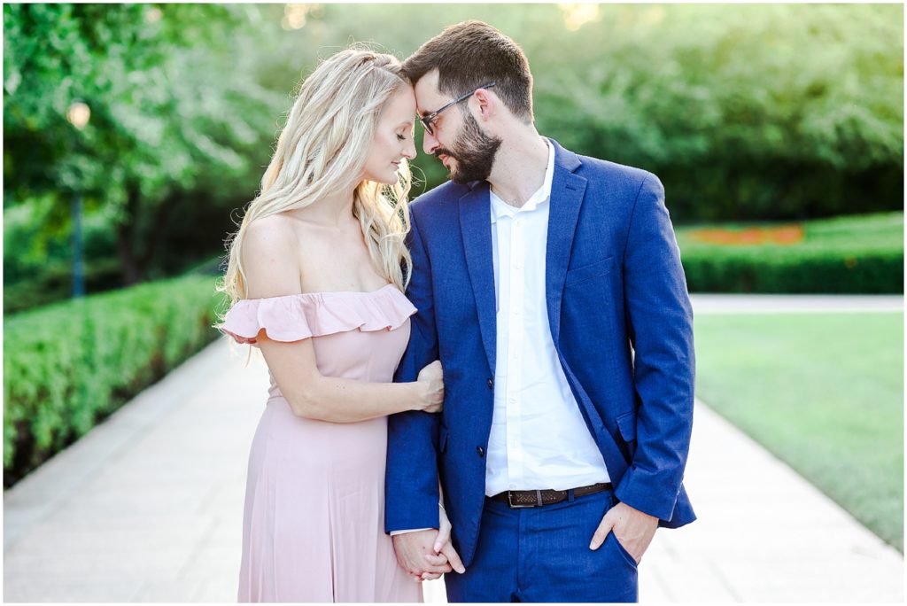 couple holding hands engagement photos 