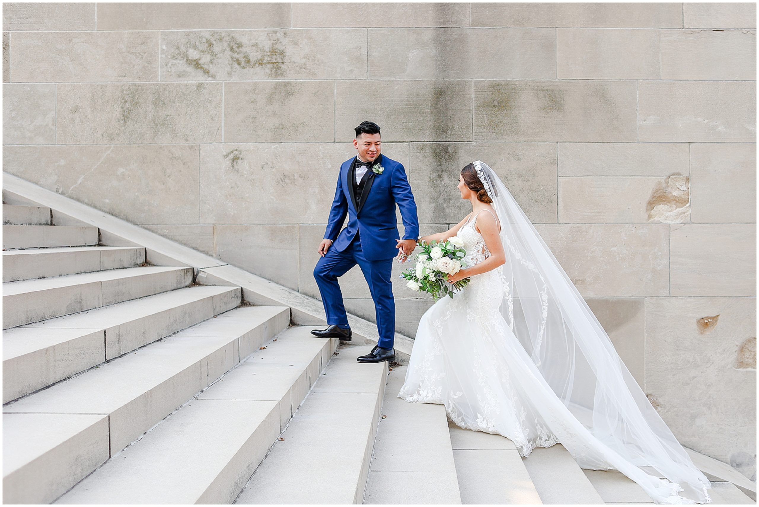 Where to take photos in Kansas City | Best Photo Locations in KC | Kansas City Wedding Photography | Liberty Memorial & Union Station - Bride & Groom Walking Up the Stairs
