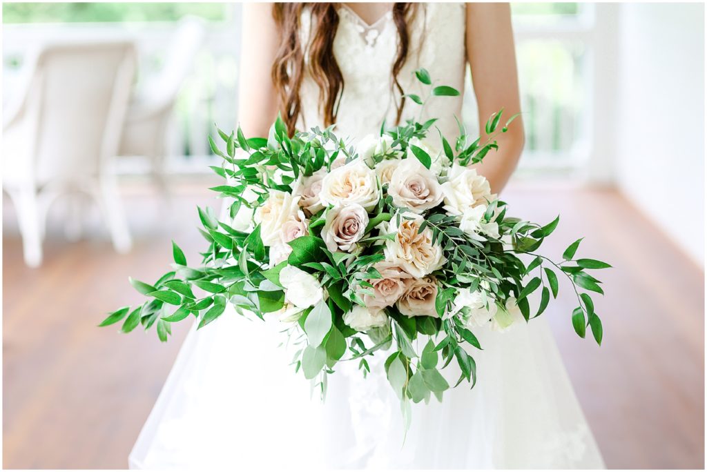 huge wedding bouquet - kansas city wedding photographers - the hawthorne house venue