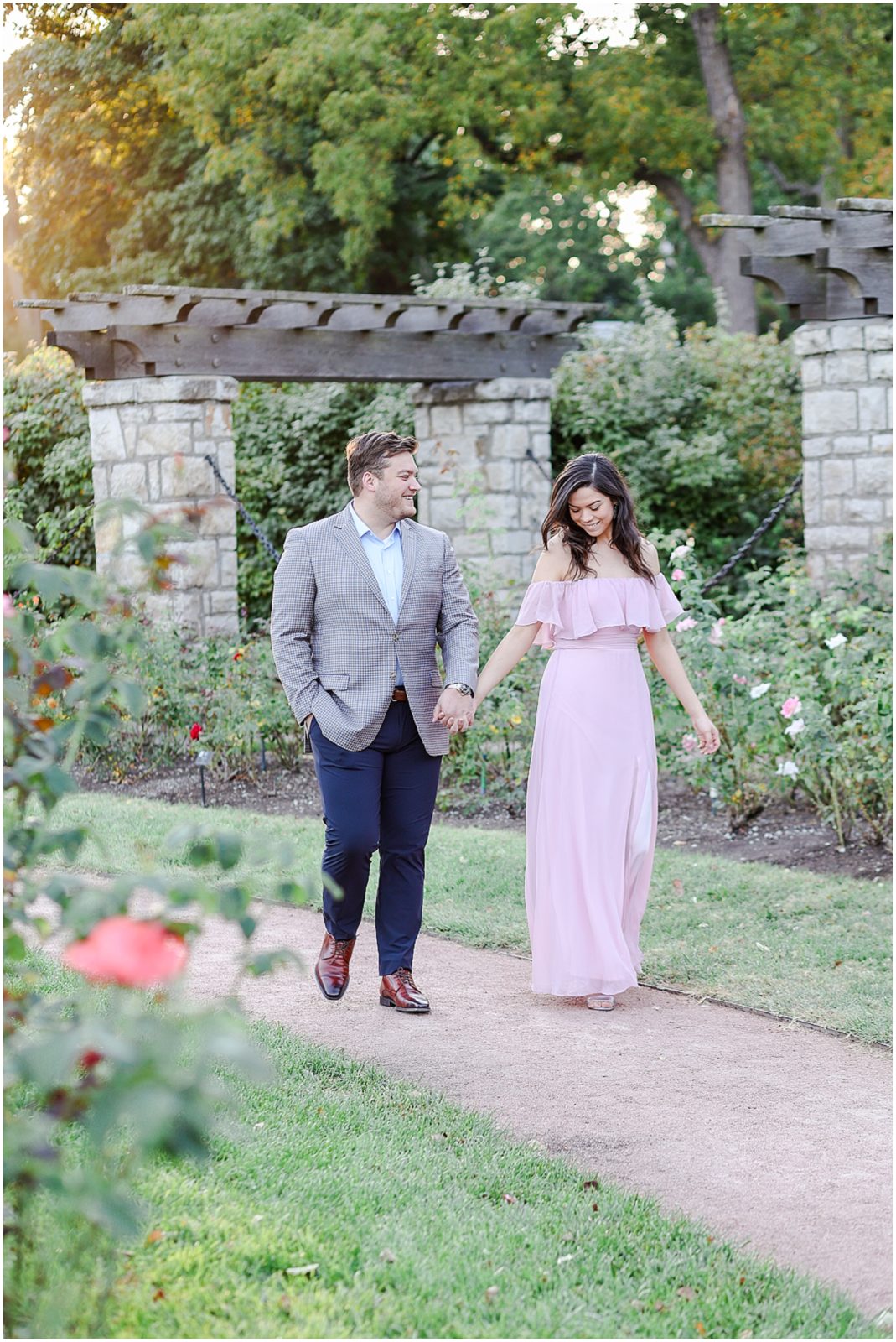 taking a walk for engagement photos at loose park - mariam saifan photography 