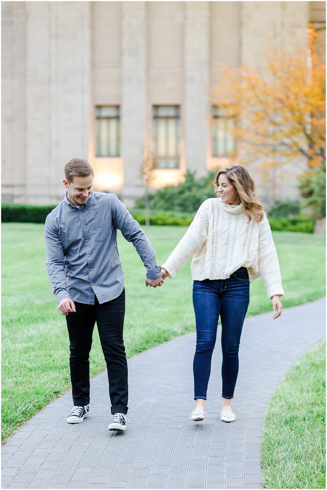 bumping hips ideas of how to take photos - Kansas City Engagement Photos & Wedding Photographer - Nelson Atkins Museum - Location ideas of where to take photos - Oakwood Country Club Wedding Photographer - engagement session