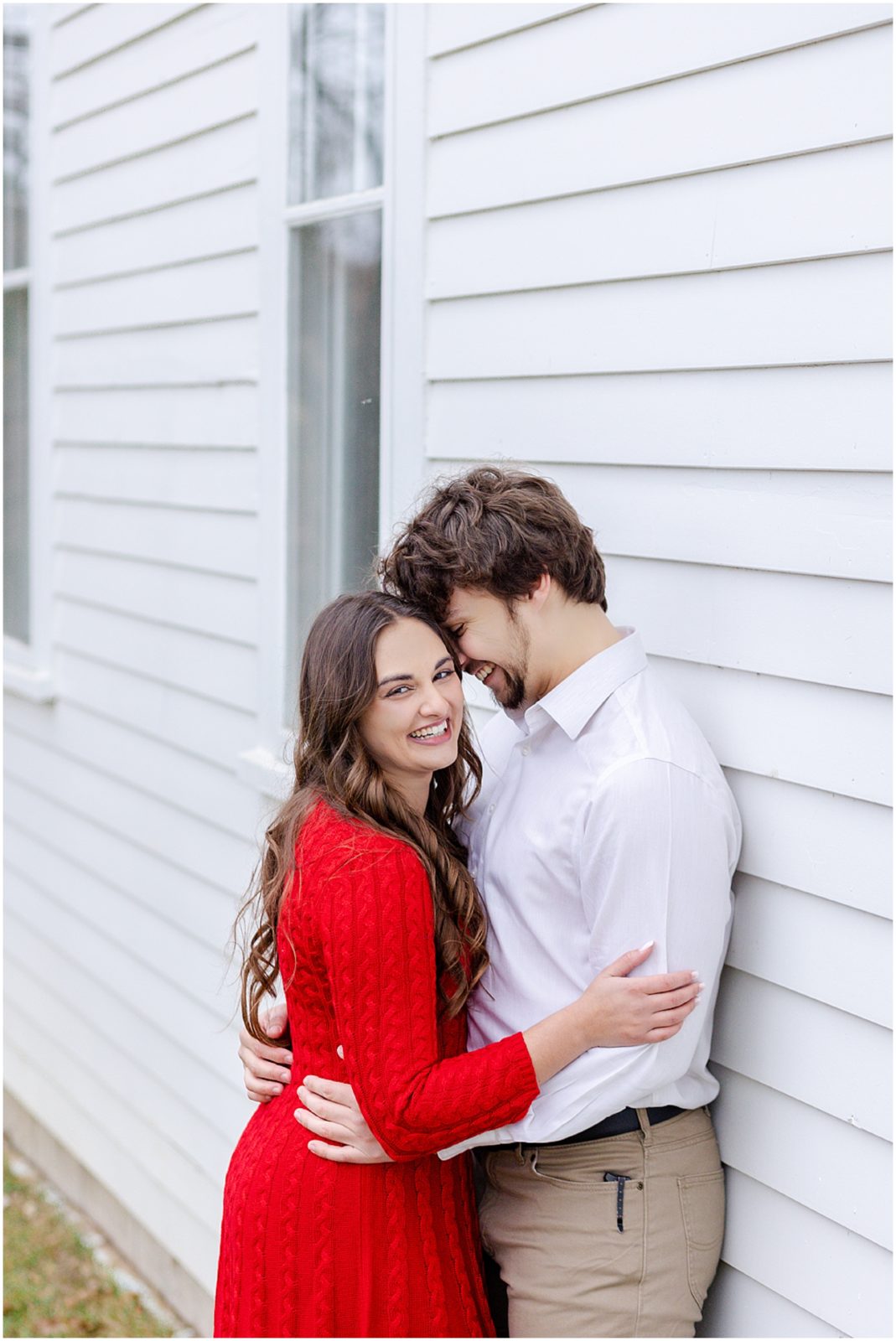 a winter engagement session in leawood kansas - christmas engagement photos - kansas city topeka wedding photographer - red dress