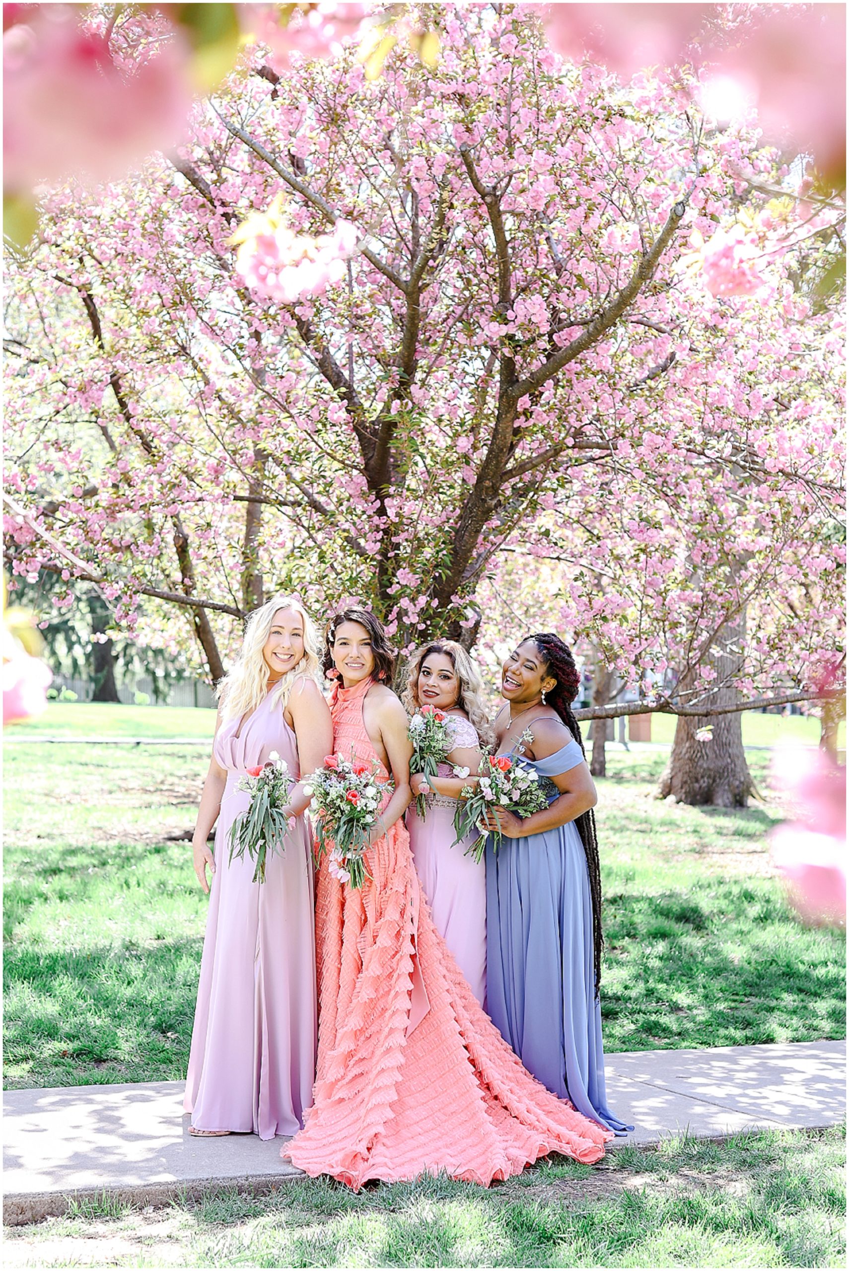 beautiful pink tress with pink wedding dress at kansas city loose park 