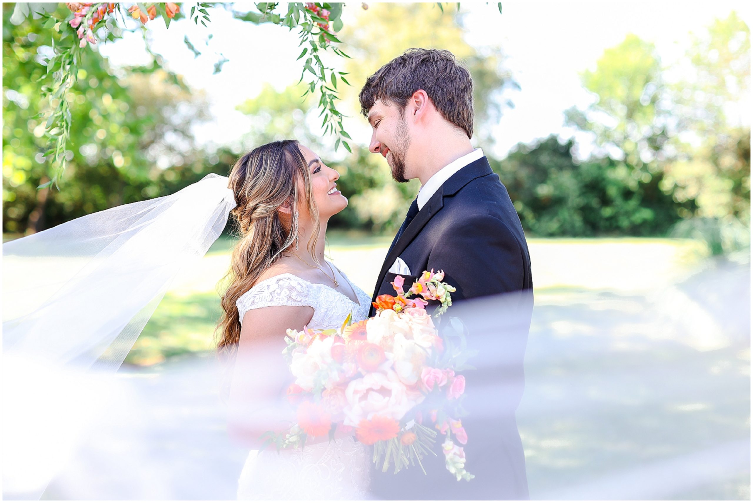 A Summer Wedding at the Topeka Brownstone Kansas - Wedding Photography in Kansas City - Engagement Photos - Colorful Wedding  - epic photo with wedding veil