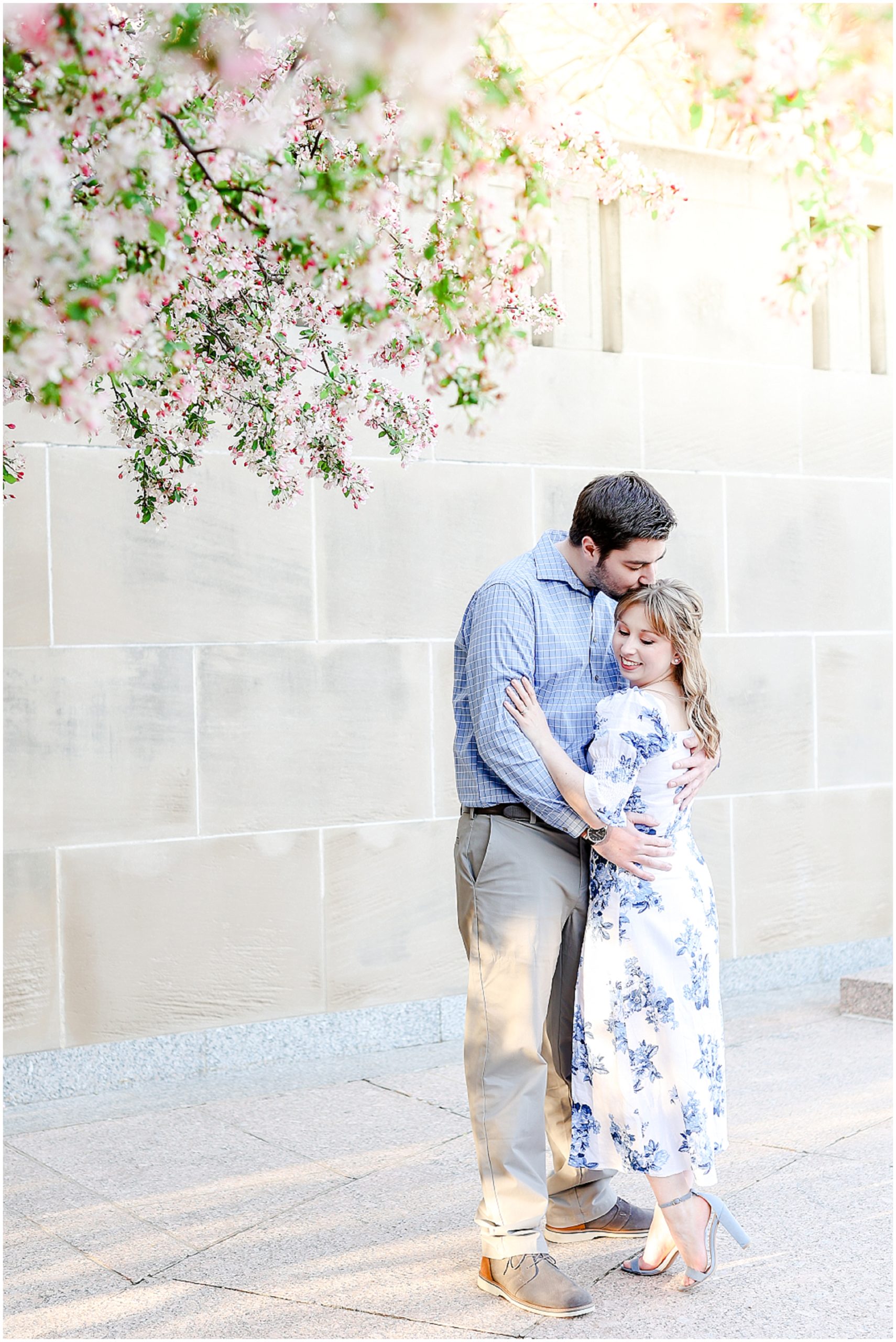 Look at what they wore for their engagement photos! Spring Engagement Photos with Ali & Connor at the Nelson Atkins Museum in Kansas City by best wedding photographer Mariam Saifan Photography - Engagement and Wedding Style Guide - What to Wear and Where to Take Your Photos in Kansas City  - spring flowers 