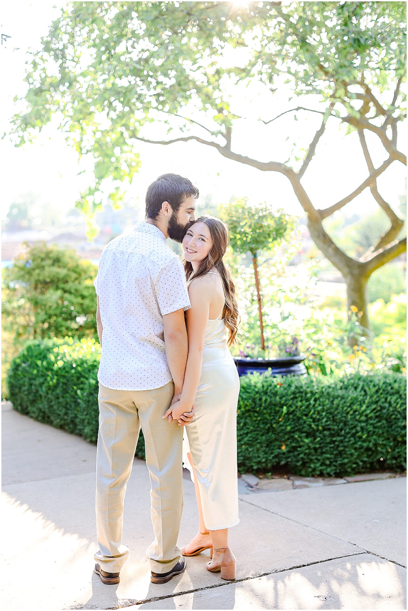 Take a look at this romantic summer engagement session at the Overland Park Arboretum! Family Photos Engagement Photos and Wedding Photos in Kansas City