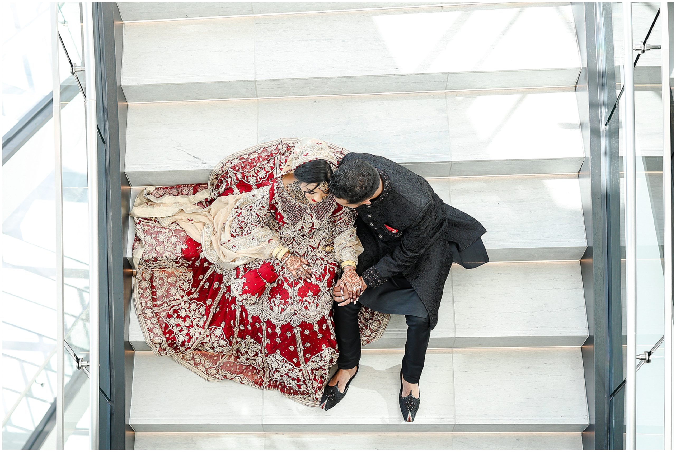 sitting on steps A Pakistani Indian Wedding in Kansas City by the best wedding photographer - Mariam Saifan Photography - Wedding Ideas - Muslim Wedding - Kauffman Center of Performing Arts - Pakistani Wedding Outfit - Wedding Makeup - Stl Wedding Photographer - Florida Indian Wedding Photography - Beautiful Bridal Makeup - Loews Kansas City Wedding Photography