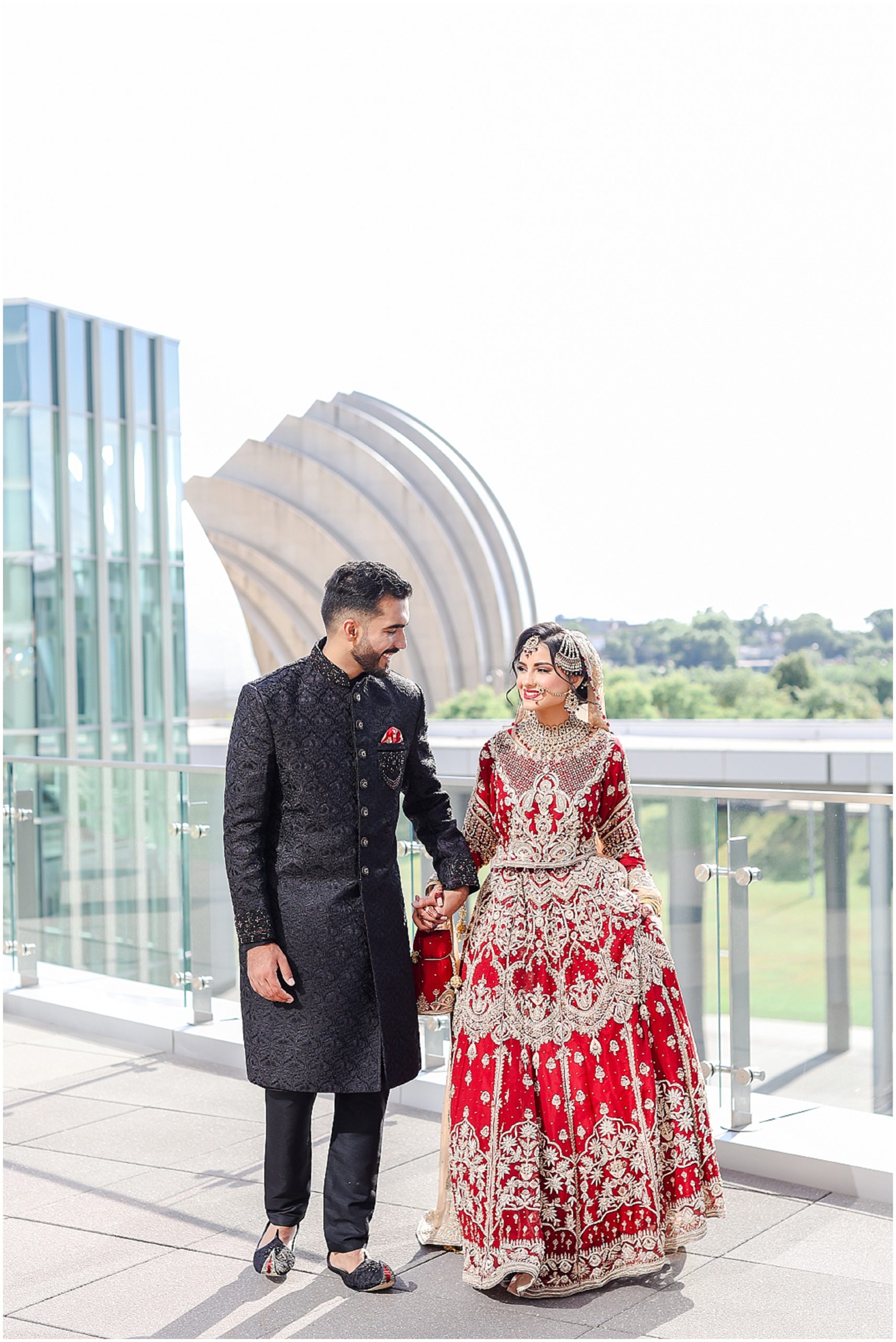 kauffman center of performing arts and loews kansas city rooftop hotel wedding by mariam saifan 