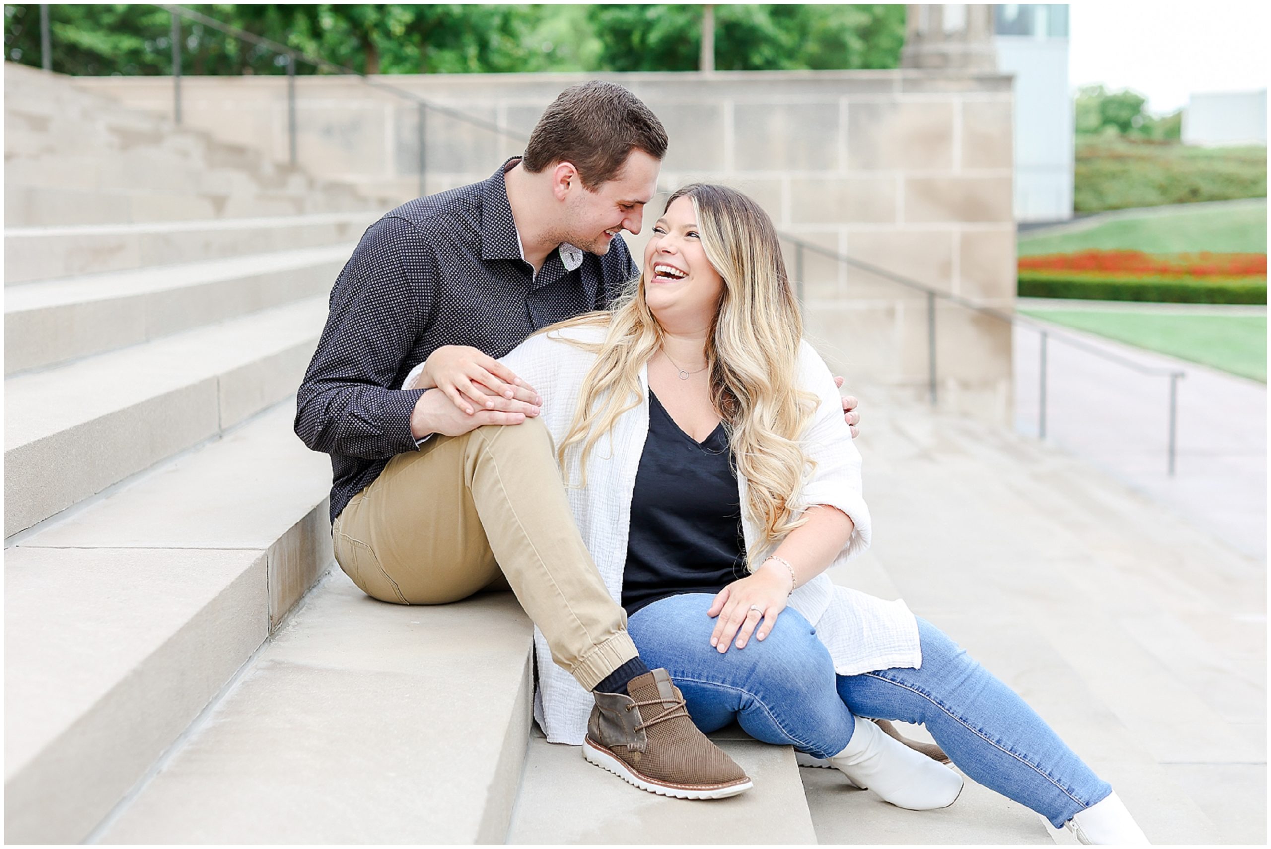 KC Engagement Session for Molly & Austin at the Kansas City Nelson Atkins Museum - Hotel Kansas City Wedding Venue - Where to Get Married in Kansas - Family Portrait Photography - laughing with each other