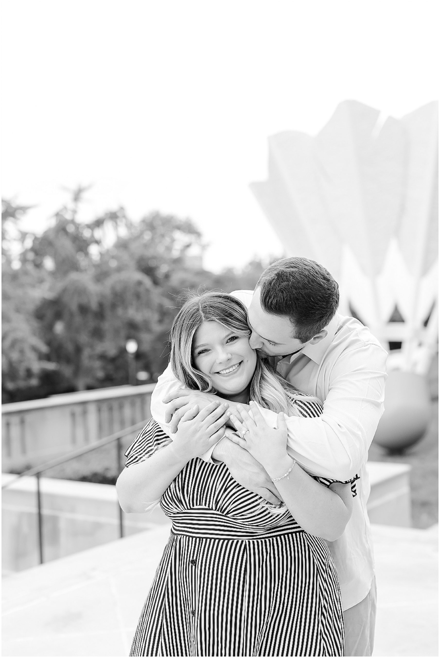 KC Engagement Session for Molly & Austin at the Kansas City Nelson Atkins Museum - Hotel Kansas City Wedding Venue - Where to Get Married in Kansas - Family Portrait Photography - hugging photo 