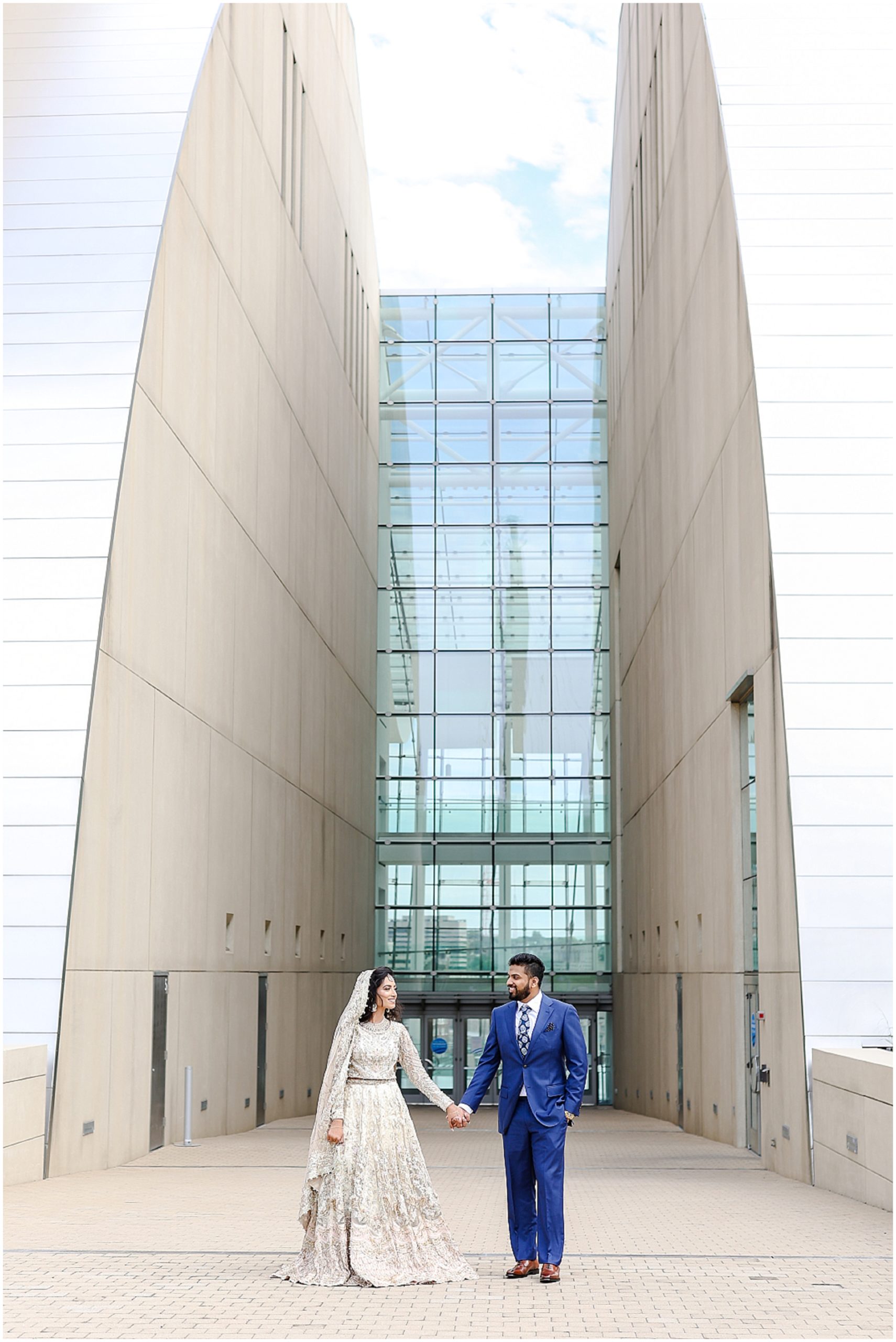 couple walking - Best Wedding Photographer in Kansas City - Mariam Saifan Photography - Indian Pakistani Muslim Punjabi Wedding Photographer & Video | Loews Hotel | Kauffman Center of Performing Arts | Family Photography | Light & Airy Wedding Photos - Beautiful Pakistani Hair & Makeup & Henna