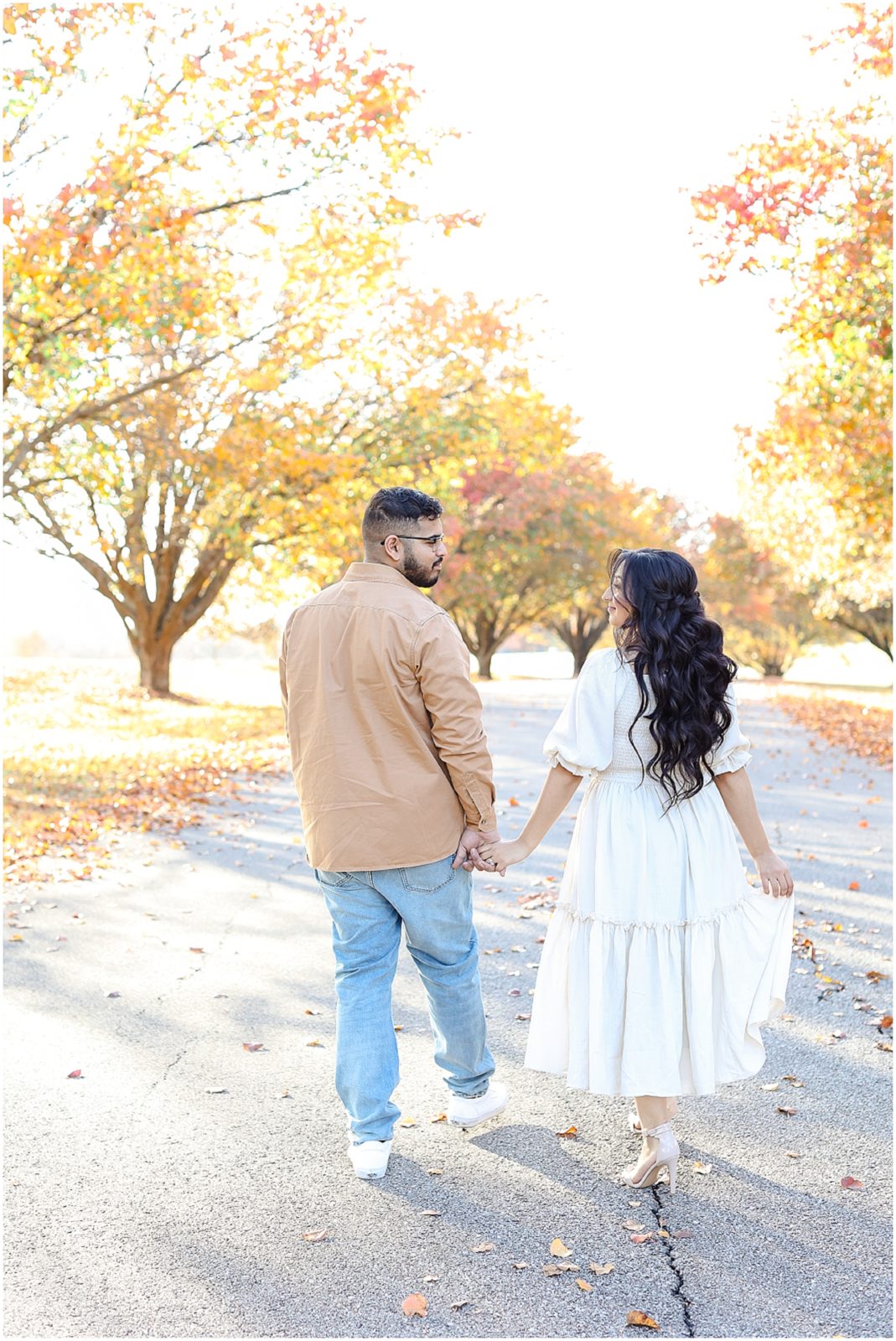 Walking away | Family Photos | Family Photographer in Kansas | Family Photography Kansas City | Shawnee Mission Park | Where to take photos in the fall | What to wear for a fall engagement or family session | Kansas City Missouri Wedding & Portrait Photography