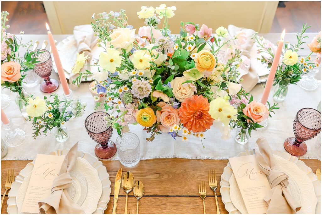 tablescape with flowers by wild hill wedding planning and florist