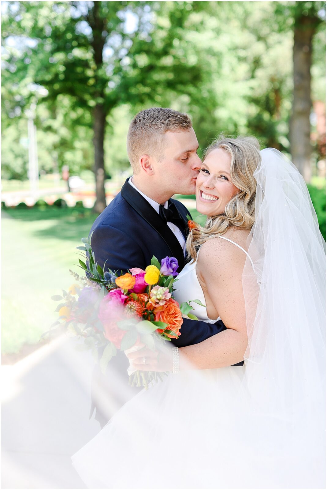 happy bride and groom portraits Colorful Summer Wedding in Kansas City at the Loose Park Rose Garden and 2016 Main Wedding Venue | Photos by Mariam Saifan Photography | Kansas City Wedding Photographer | Gorgeous PInk Flowers | Stunning Luxury Wedding Photos | Martha Stewart Weddings | Vogue Weddings | Destination Wedding Photographer | Pink Bridal Party Dresses & Colorful Wedding Flowers 