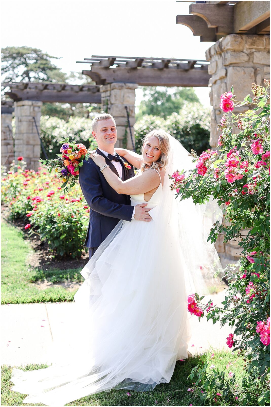 Colorful Summer Wedding in Kansas City at the Loose Park Rose Garden and 2016 Main Wedding Venue | Photos by Mariam Saifan Photography | Kansas City Wedding Photographer | Gorgeous PInk Flowers | Stunning Luxury Wedding Photos | Martha Stewart Weddings | Vogue Weddings | Destination Wedding Photographer | Pink Bridal Party Dresses & Colorful Wedding Flowers 