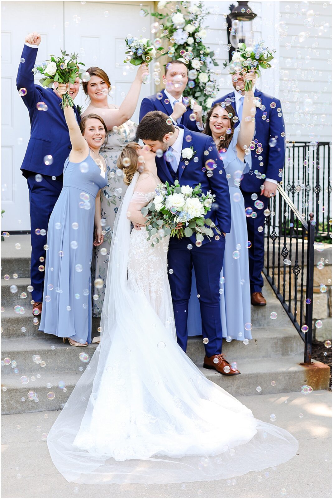 happy bridal party photos at the hawthorne house with blue and white flowers and theme - kansas city wedding photographer mariam saifan