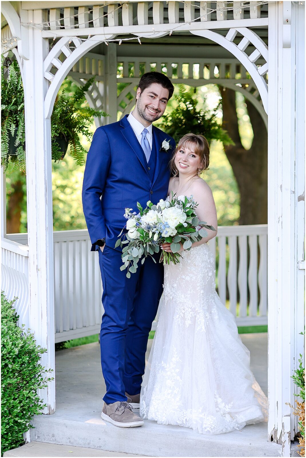 happy bridal party photos at the hawthorne house with blue and white flowers and theme - kansas city wedding photographer mariam saifan