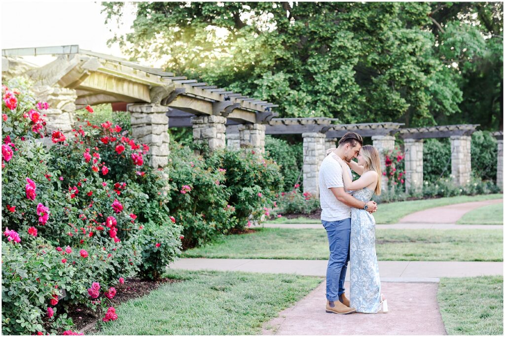 Stunning Romantic Engagement Photos in Kansas City with Light & Airy Vibrant Colors at a Rose Garden in Loose Park and the Nelson Atkins Museum | Isabelle & Collyn | KC Wedding and Engagement Photographer Mariam Saifan Photography