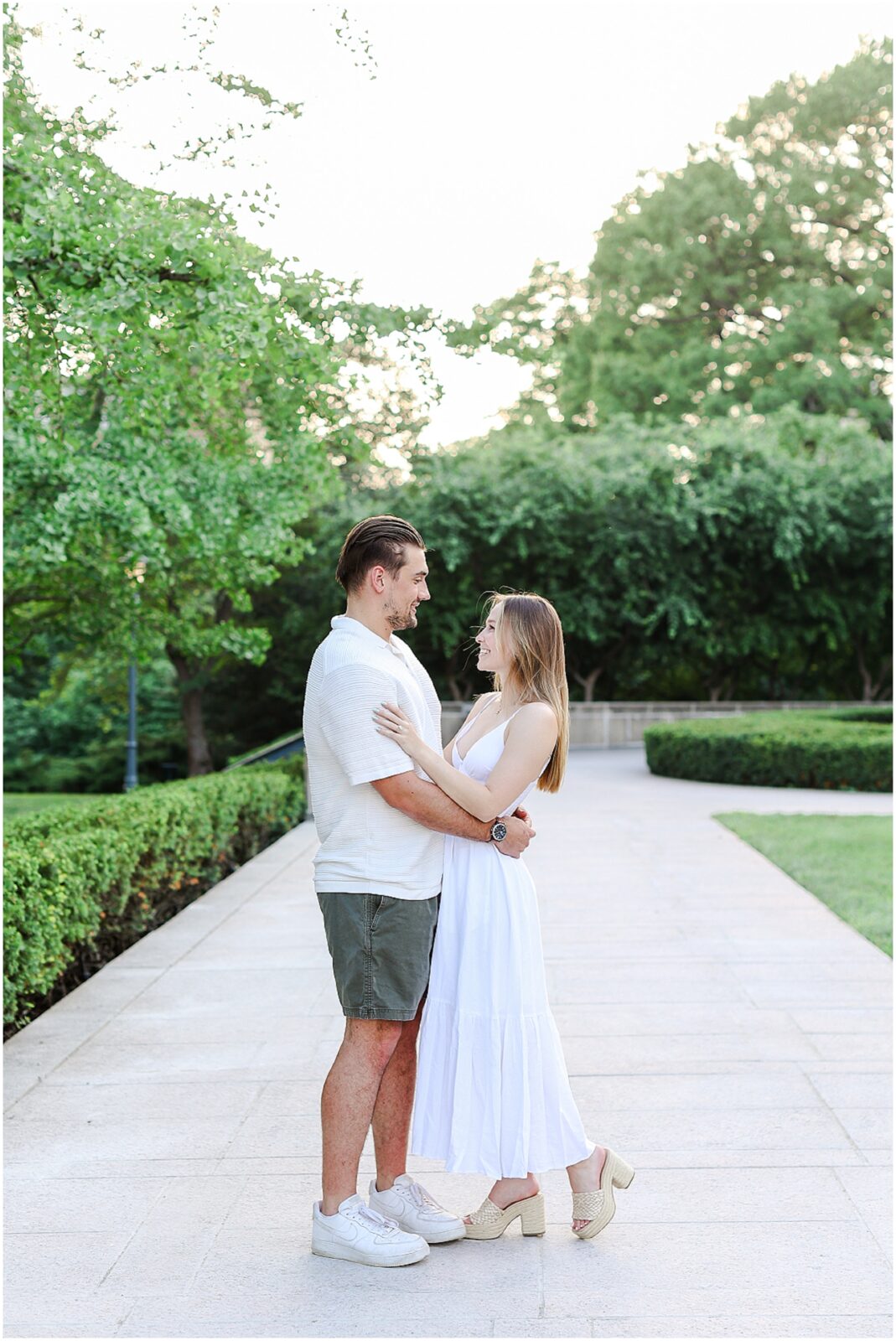 Stunning Romantic Engagement Photos in Kansas City with Light & Airy Vibrant Colors at a Rose Garden in Loose Park and the Nelson Atkins Museum | Isabelle & Collyn | KC Wedding and Engagement Photographer Mariam Saifan Photography