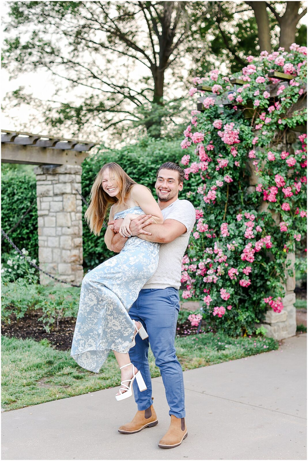 Stunning Romantic Engagement Photos in Kansas City with Light & Airy Vibrant Colors at a Rose Garden in Loose Park and the Nelson Atkins Museum | Isabelle & Collyn | KC Wedding and Engagement Photographer Mariam Saifan Photography