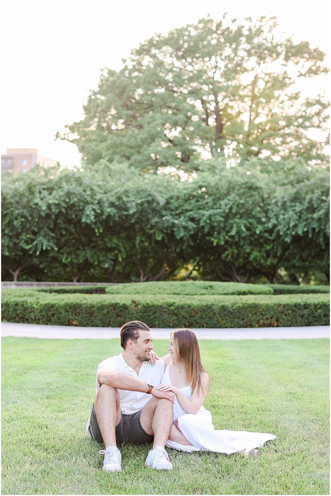 Stunning Romantic Engagement Photos in Kansas City with Light & Airy Vibrant Colors at a Rose Garden in Loose Park and the Nelson Atkins Museum | Isabelle & Collyn | KC Wedding and Engagement Photographer Mariam Saifan Photography