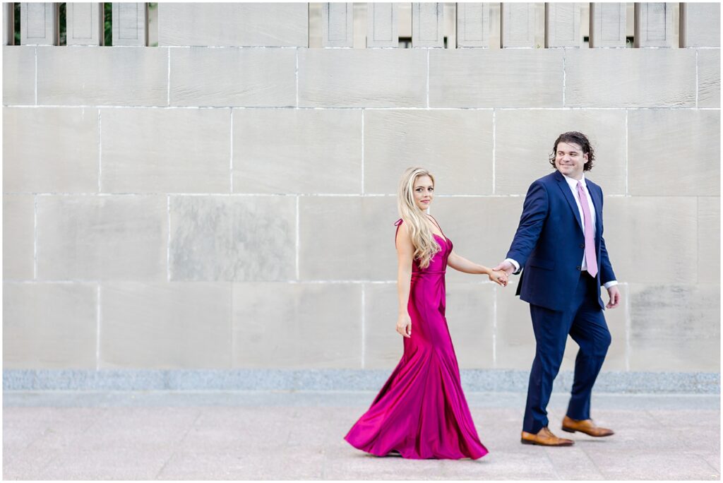 walking couple - Gorgeous Kansas City engagement photos, the nelson atkins museum of art in kansas city - what to wear to a summer engagement - where to take engagement photos - Kansas City wedding venues - Mariam Saifan Photography - Wedding Photography Education 