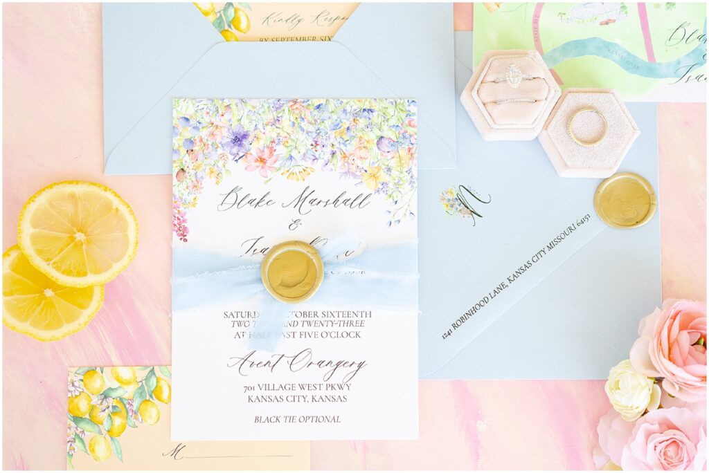 Kansas City luxury wedding photography - Mariam saifan photography - flatlay wedding details - colorful wedding invitations with flowers and lemons - citrus garden theme  wedding invitations 