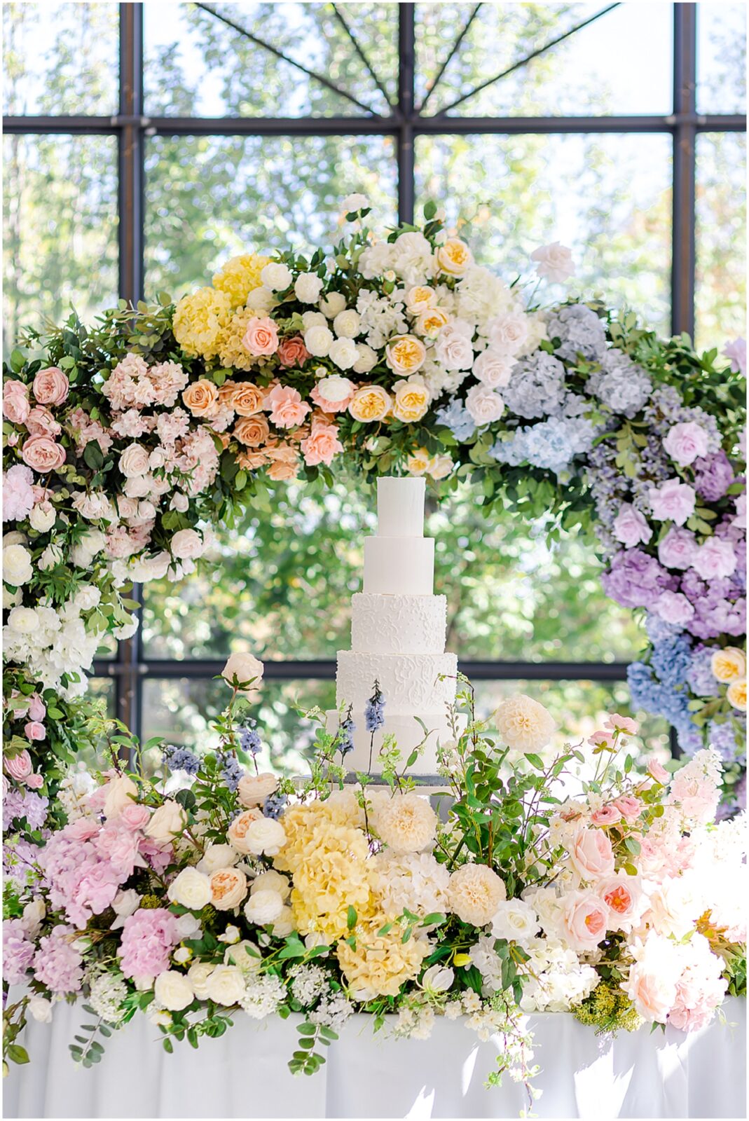 gorgeous class white wedding cake with flowers - Wedding centerpieces ideas - wedding flower ideas - colorful wedding photography and floral - tablespace - wedding decor - Italian Styled Garden Wedding by Kansas City STL Florida 30A Wedding Photography Mariam Saifan Photography