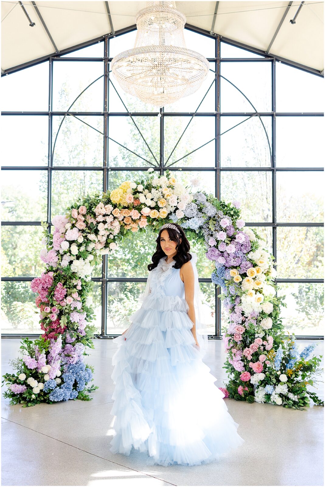 Light blue wedding dress - floral archway for wedding - gorgeous floral archway kansas city luxury wedding photographer Mariam Saifan Photography - Curated Gowns - wedding hair and makeup ideas - avent orangery - beautiful bridal photos - bridal photography - 30a florida wedding photography