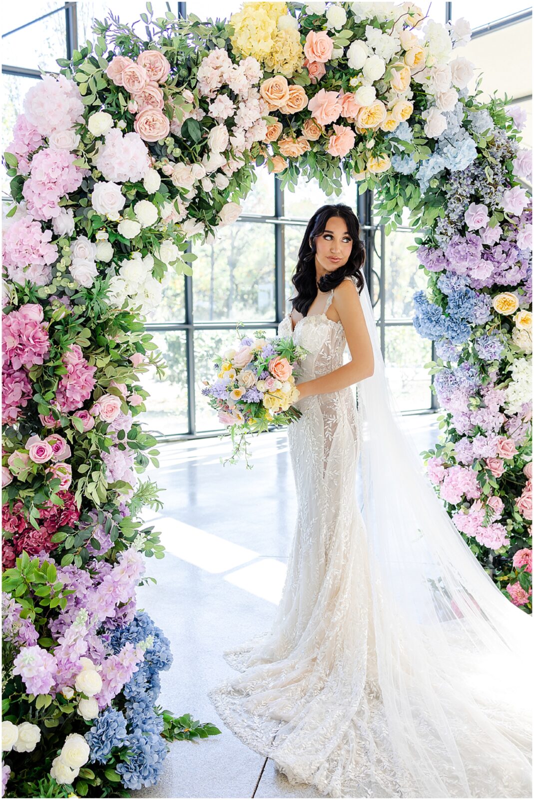 Light blue wedding dress - floral archway for wedding - gorgeous floral archway kansas city luxury wedding photographer Mariam Saifan Photography - Curated Gowns - wedding hair and makeup ideas - avent orangery - beautiful bridal photos - bridal photography - 30a florida wedding photography