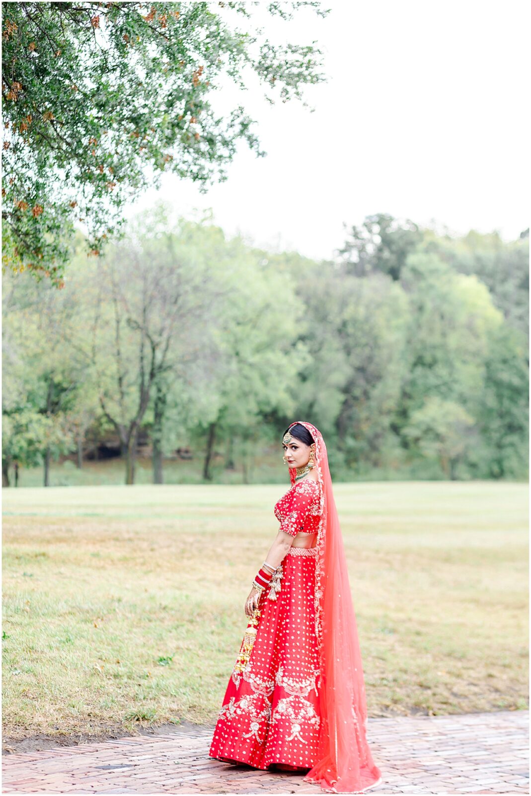 Elegant South Asian Bridal Portraits - Step into the Beauty of an Indian Fusion Sikh Wedding at Kansas Mildale Farms, including Sangeet, henna, baraat, dholi, through the Lens of Mariam Saifan Photography, Kansas City's Top Wedding Photographe