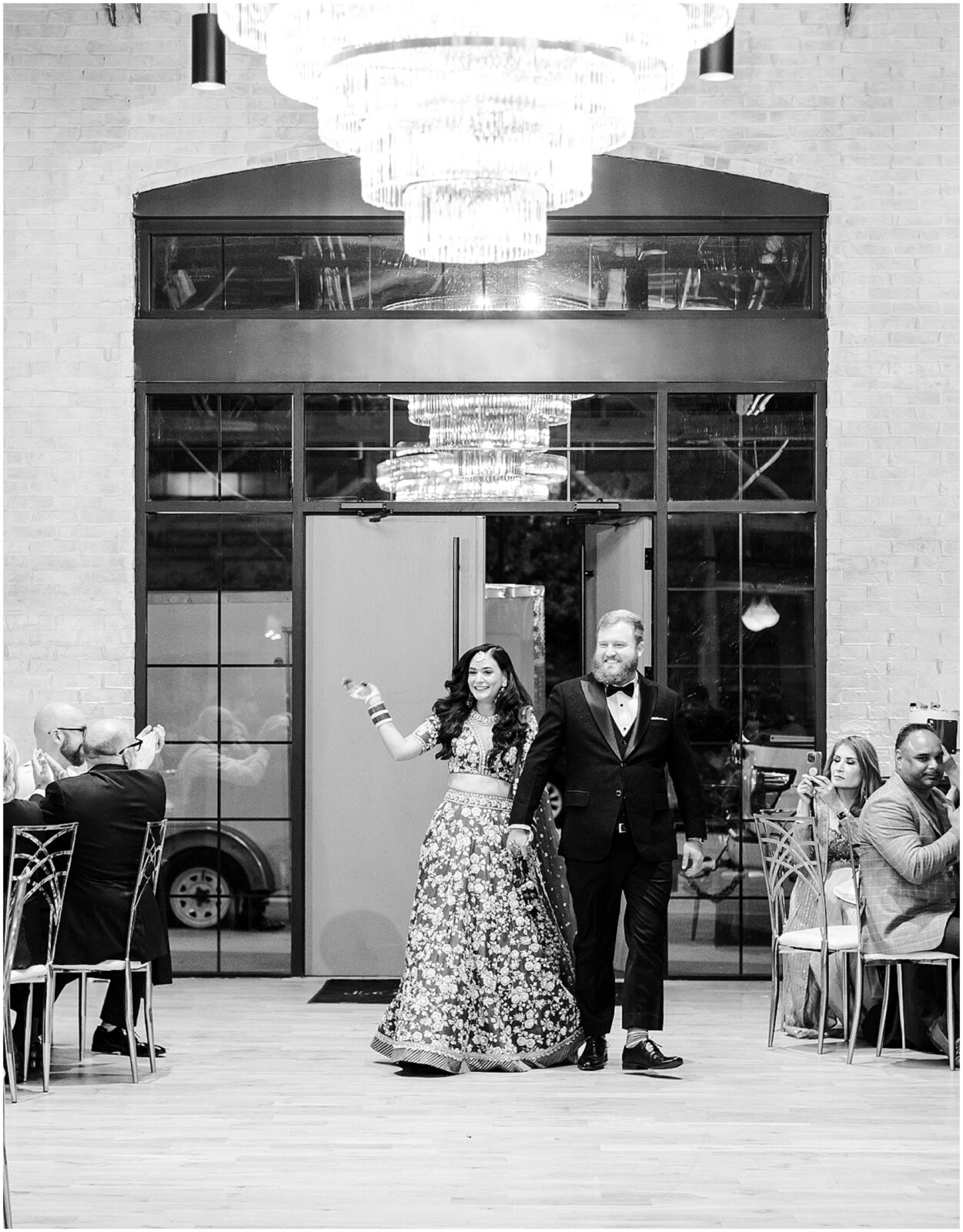 wedding reception grand entrance - Elegant Indian Wedding Reception Venue at Loews, Kansas City, Illuminated with Romantic Lighting and Decor, Perfectly Captured by Mariam Saifan Photography - The Bardot Kansas City Venue