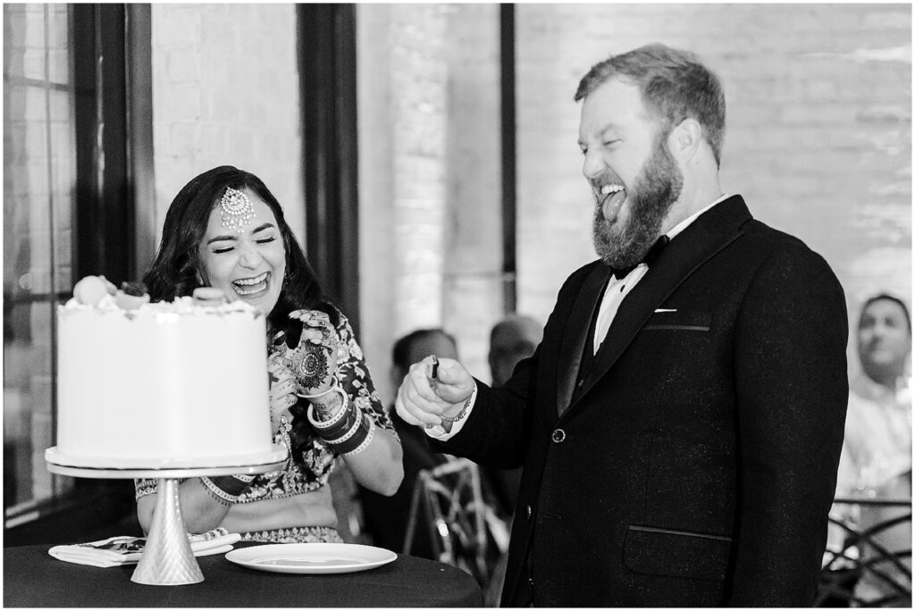 cake cutting - Elegant Indian Wedding Reception Venue at Loews, Kansas City, Illuminated with Romantic Lighting and Decor, Perfectly Captured by Mariam Saifan Photography - The Bardot Kansas City Venue